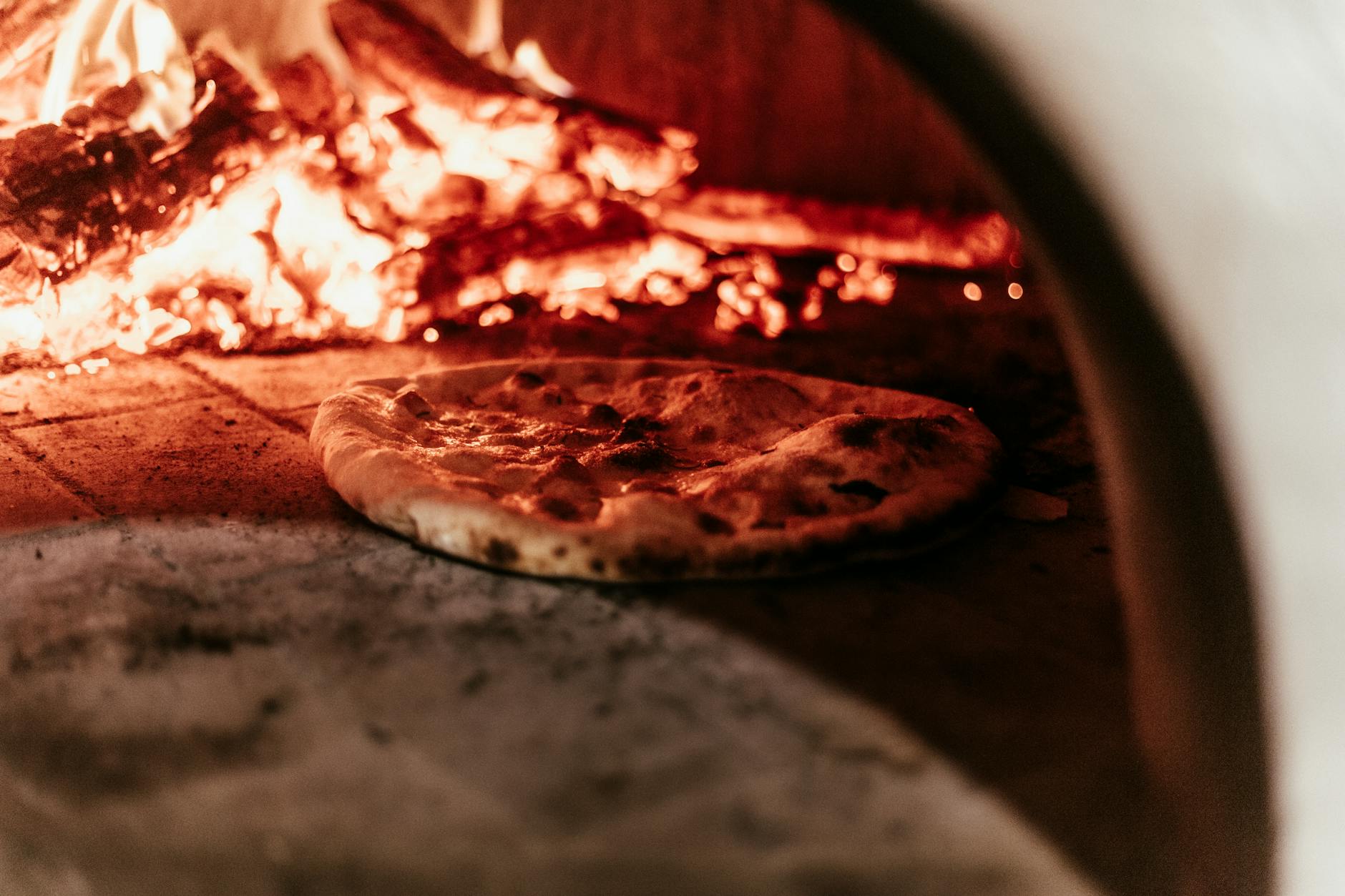 Dodo Pizza Faces Backlash After Courier Fired for Helping Dog - News